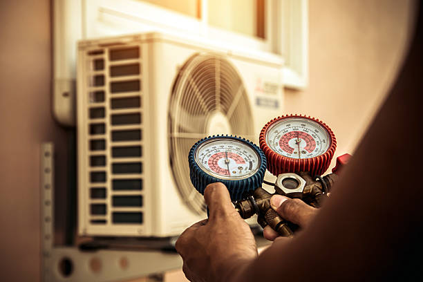 Professional Heat Pump Repair technician working in Lakewood, WA